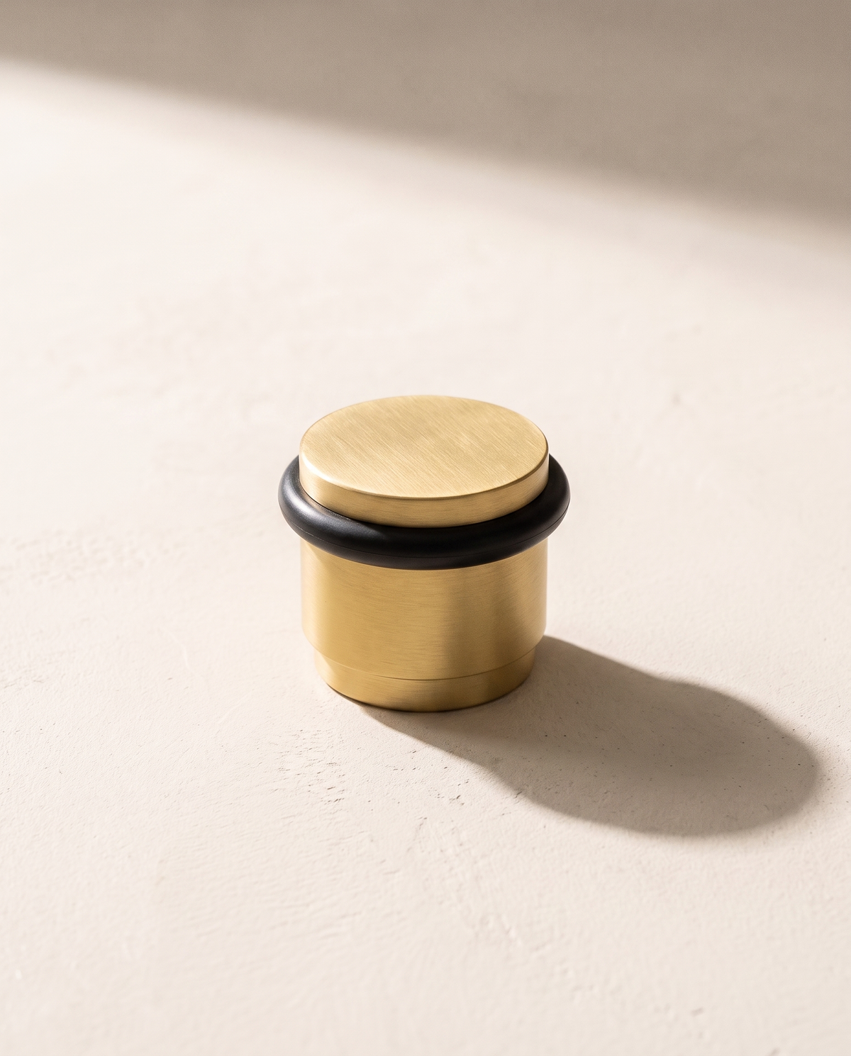 Lumo Low-Profile Brass Door Stop