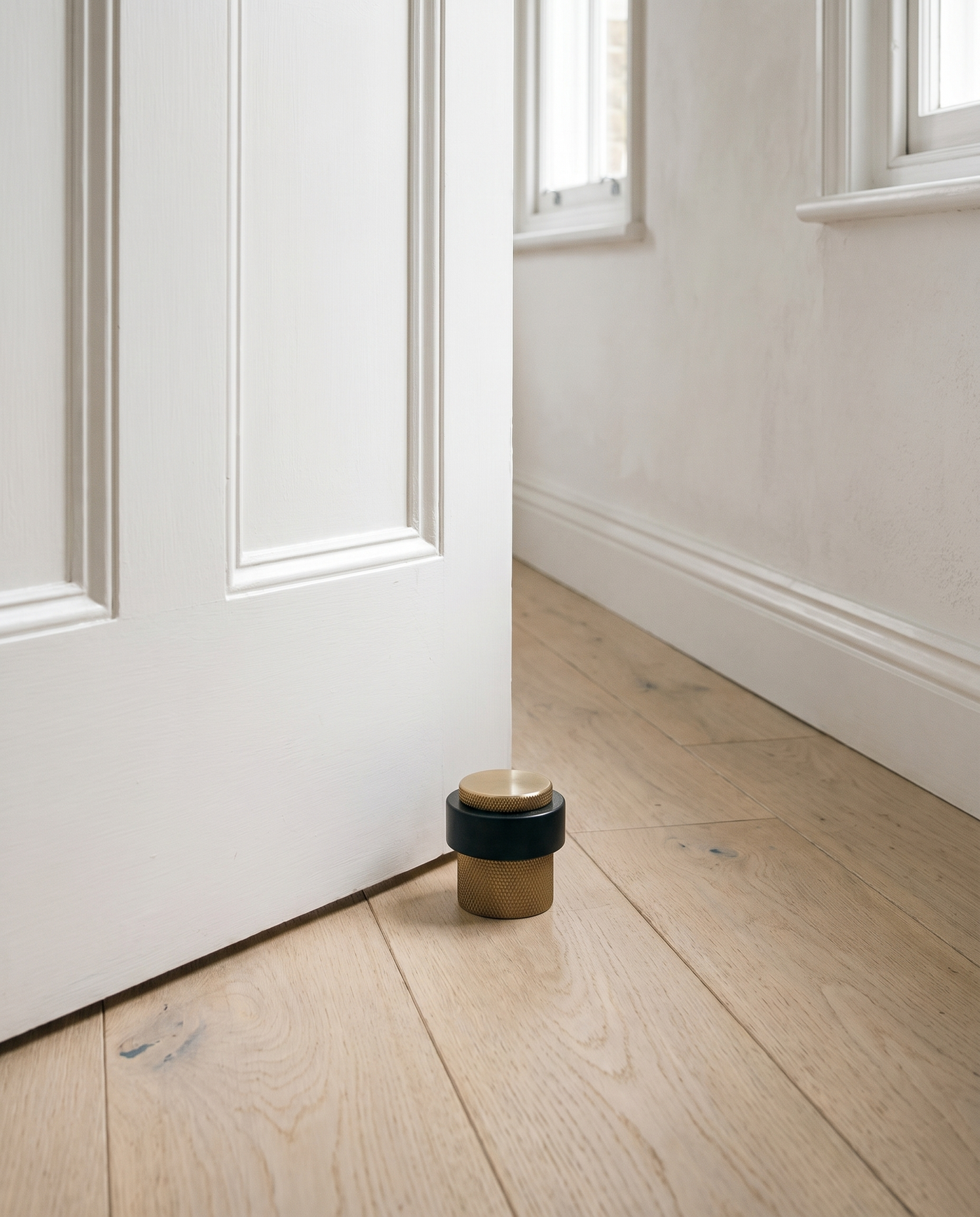 Vela Knurled Solid Brass Door Stop