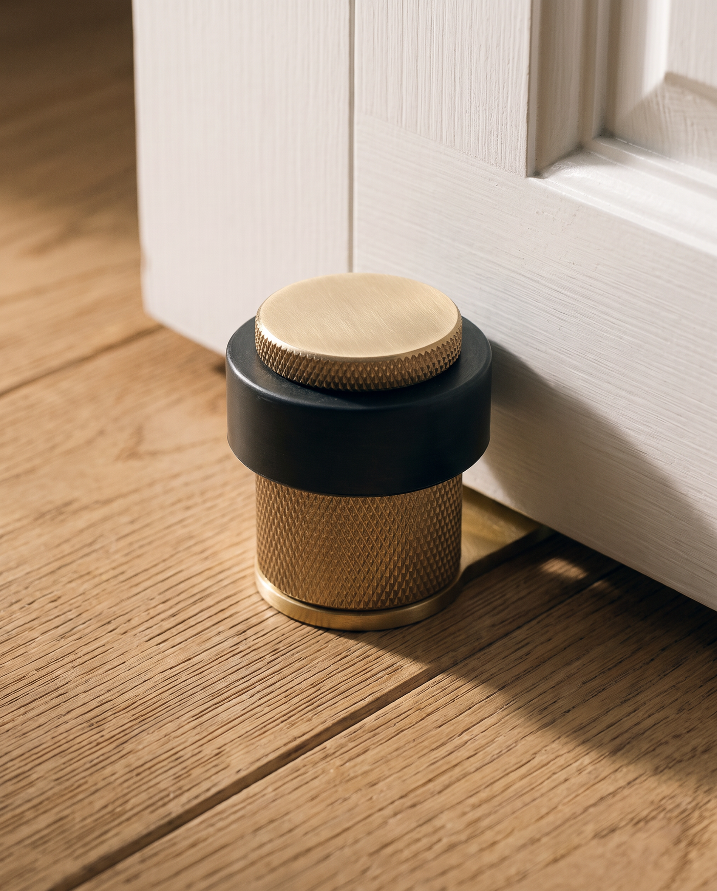 Vela Knurled Solid Brass Door Stop