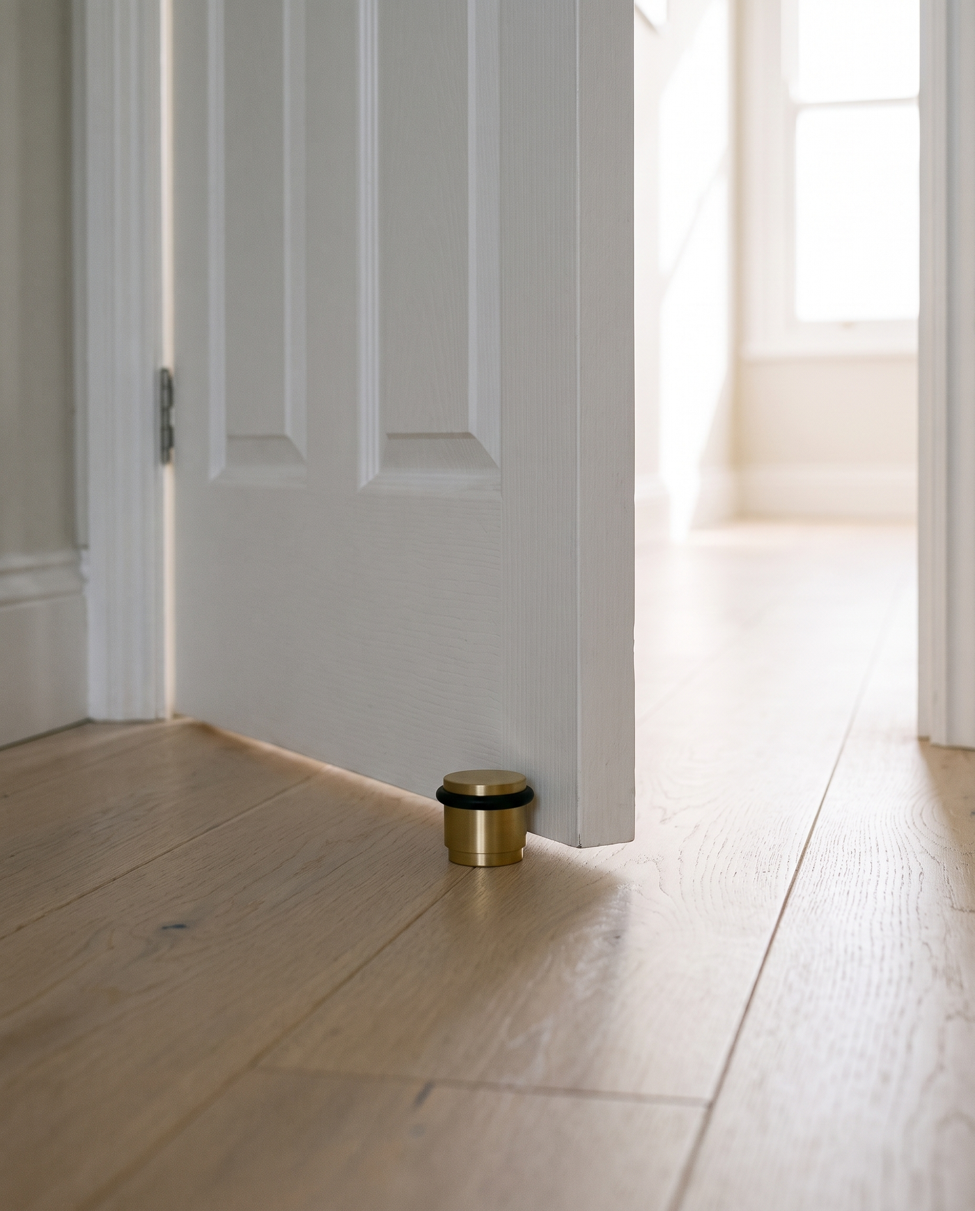 Lumo Low-Profile Brass Door Stop