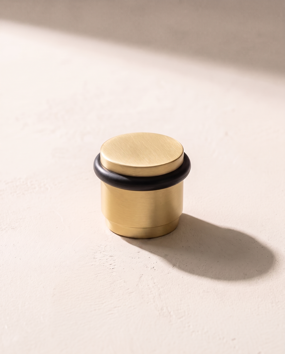 Lumo Low-Profile Brass Door Stop