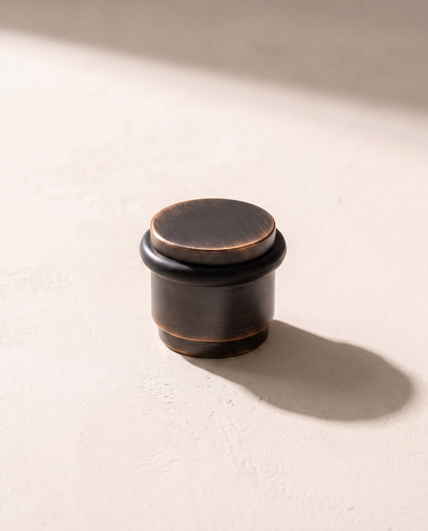 Lumo Low-Profile Brass Door Stop