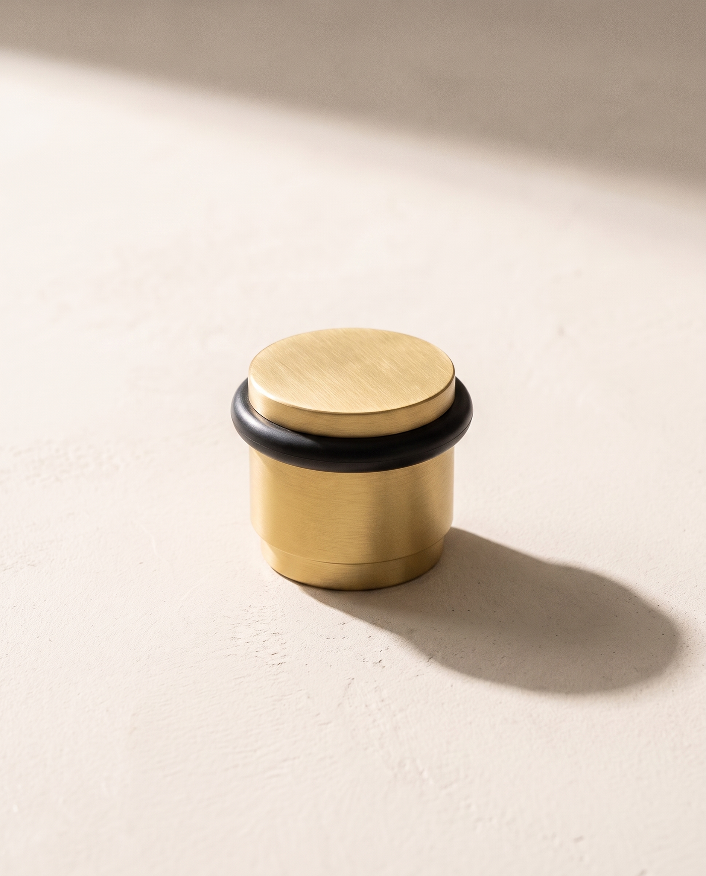Lumo Low-Profile Brass Door Stop