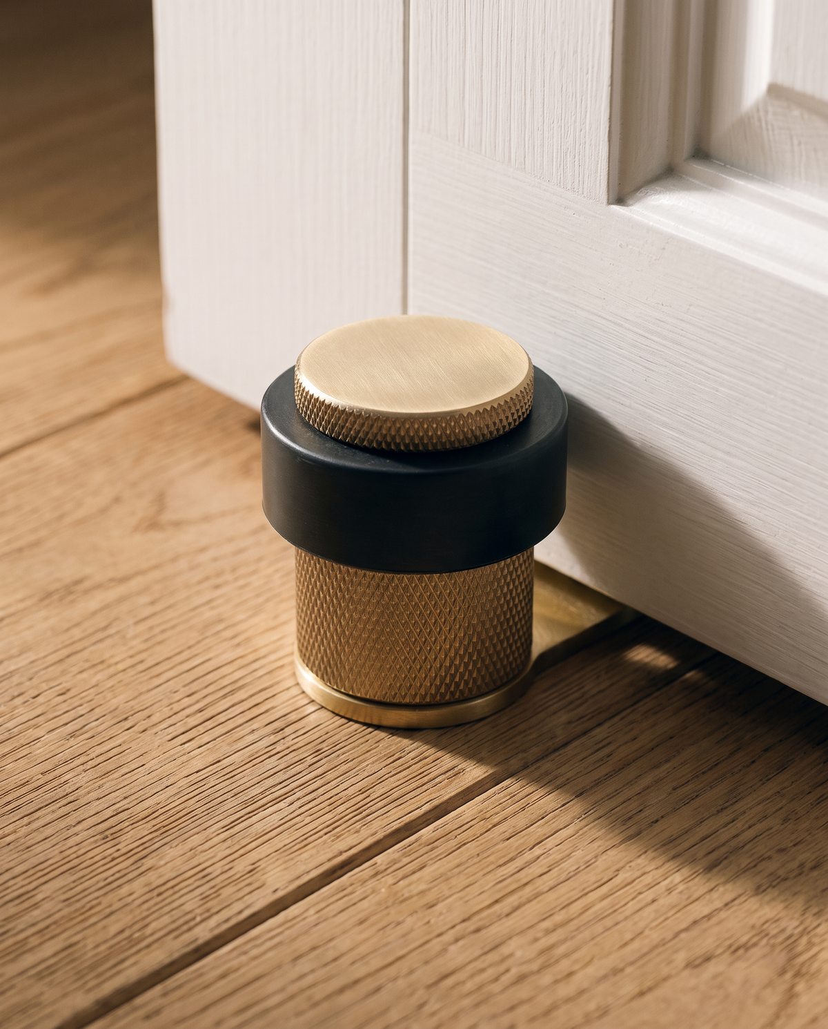 Vela Knurled Solid Brass Door Stop