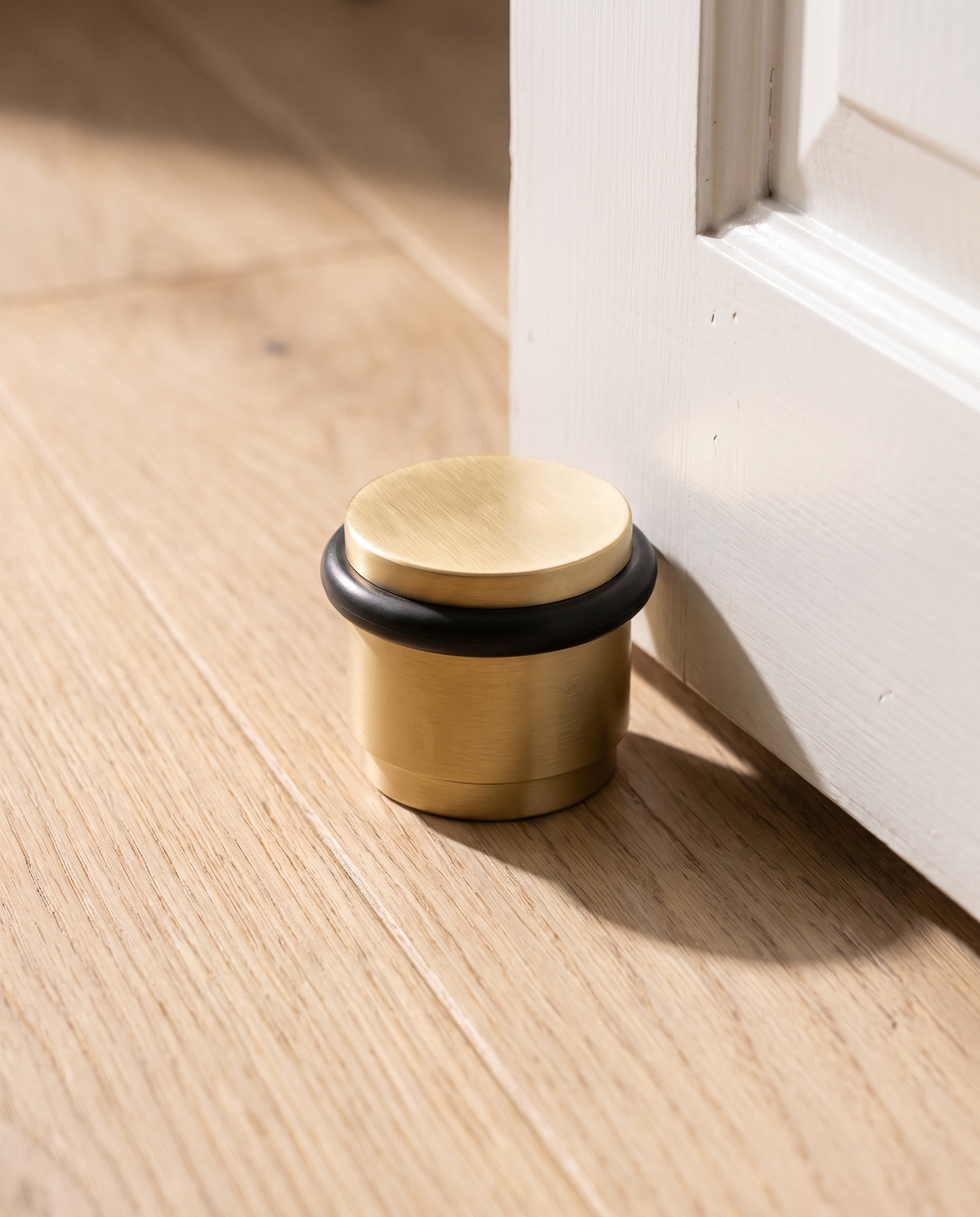 Lumo Low-Profile Brass Door Stop