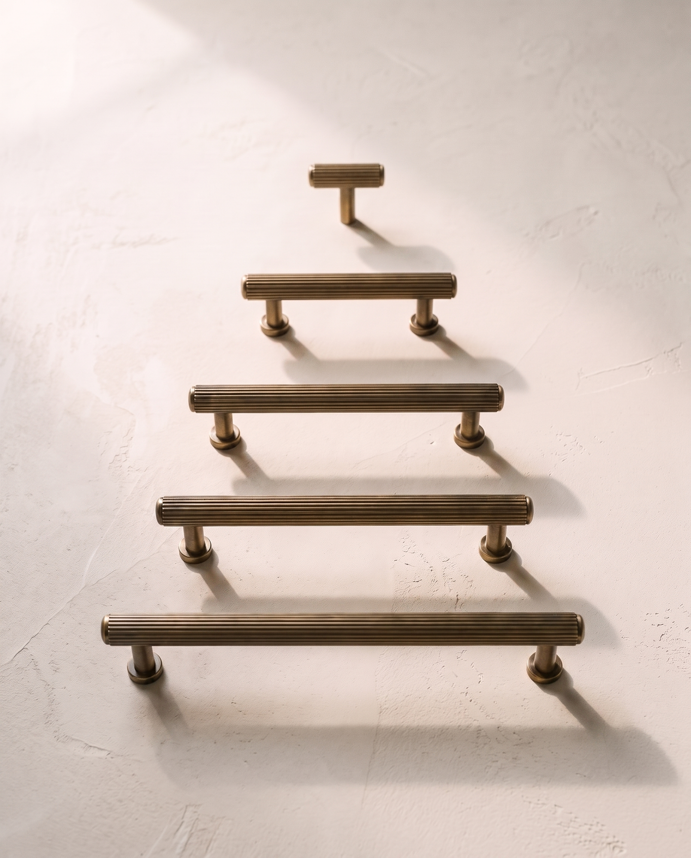 Riva Ribbed Solid Brass Cabinet Family